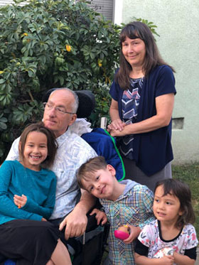 Pastor Esposito, Mrs. Esposito, and grandchildren